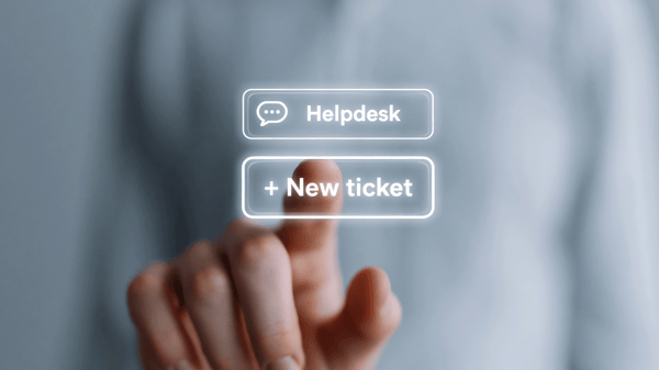 Helpdesk professional using digital interface for business support ticket service
