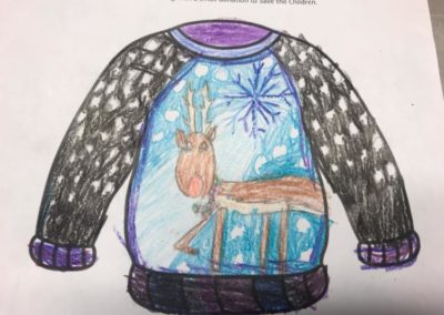 Gorgeous Reindeer In The Snow Won first place in the Christmas jumper design competition.